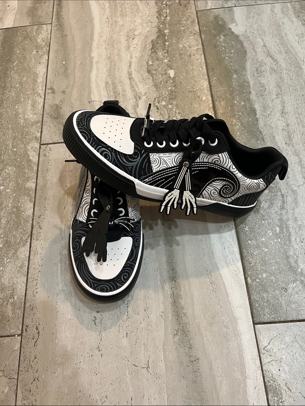 Black and White Skate Sneakers with Swirl Design
